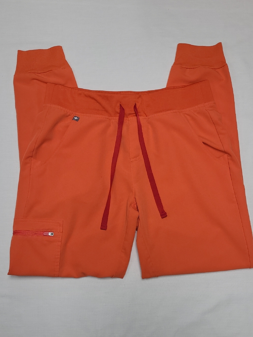Figs Technical  Collection  Orange Jogger scrubs with Maroon Drawstrings